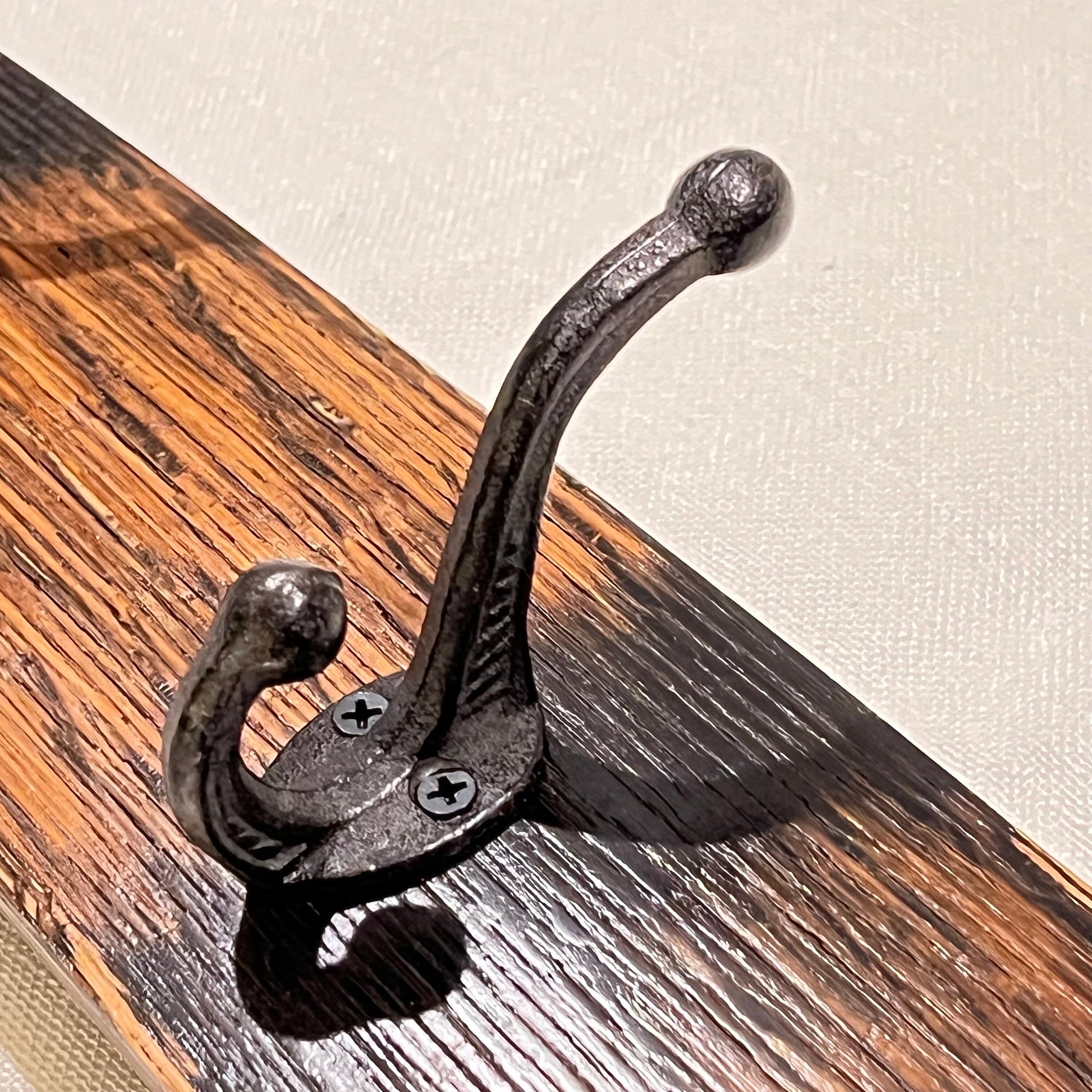 Coat rack, bourbon barrel stave, 5 rustic hooks, black, close-up of hook